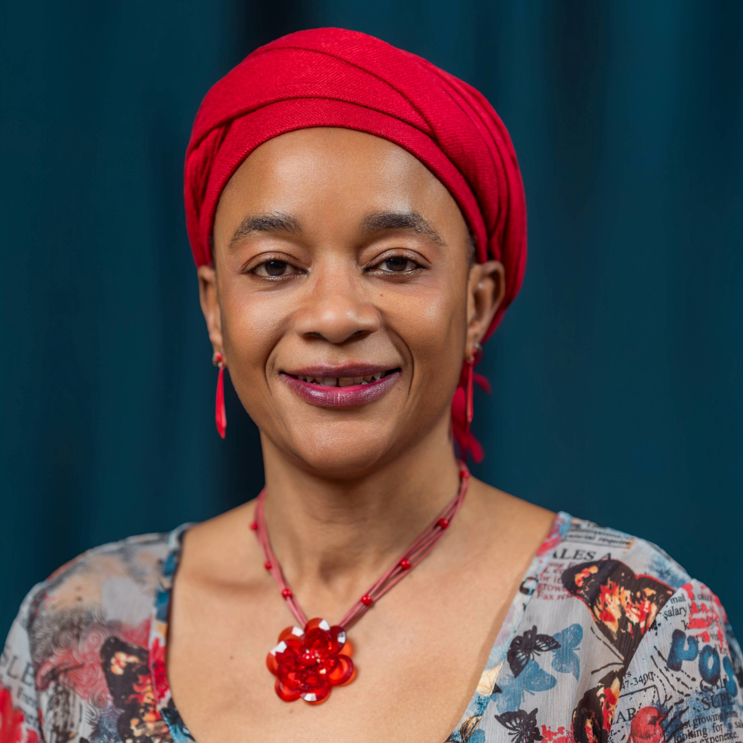 A person wearing a red dressDescription automatically generated